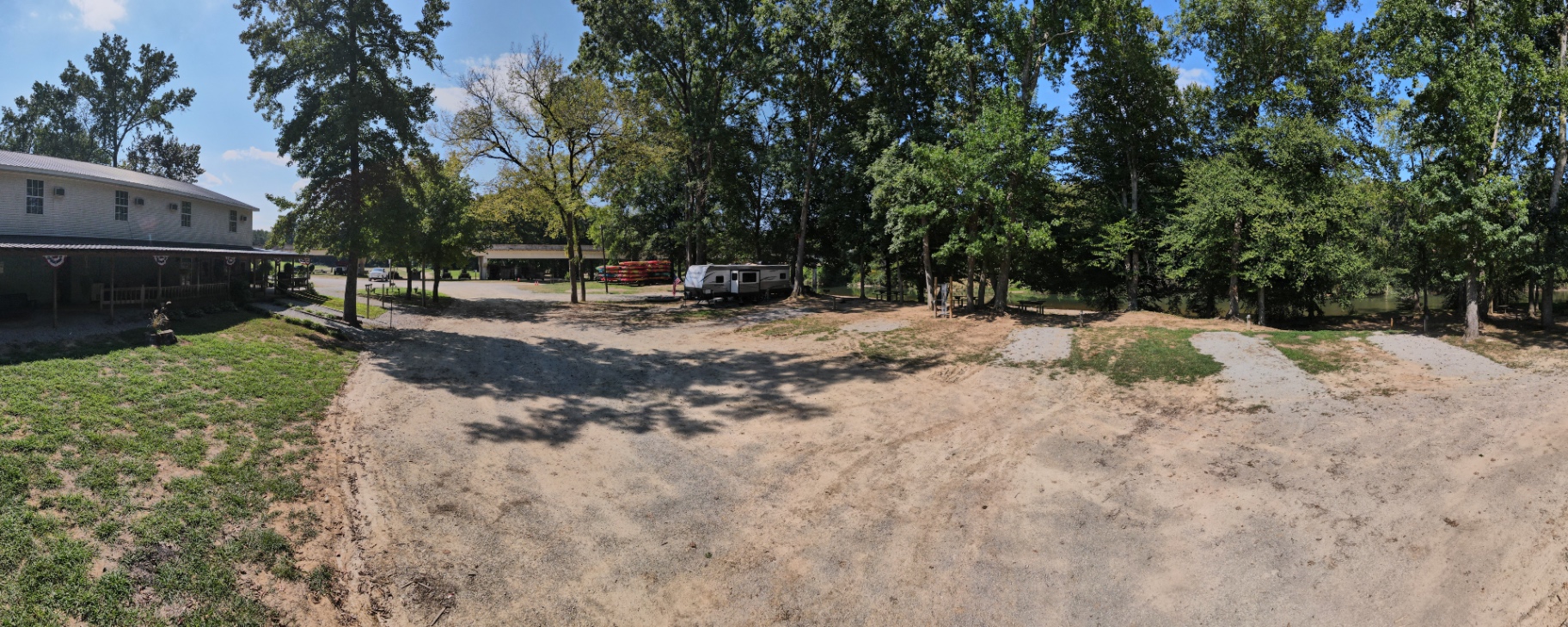 Panoramic view of RV sites beside the lodge and camp store