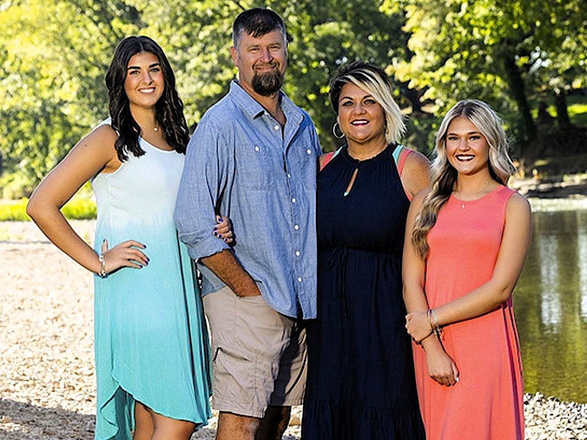 Mason and Becky Jones with their daughters beside the Buffalo River