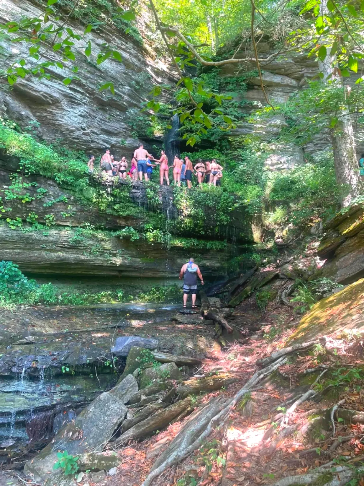 Floaters exploring the waterfall bluff on the way down