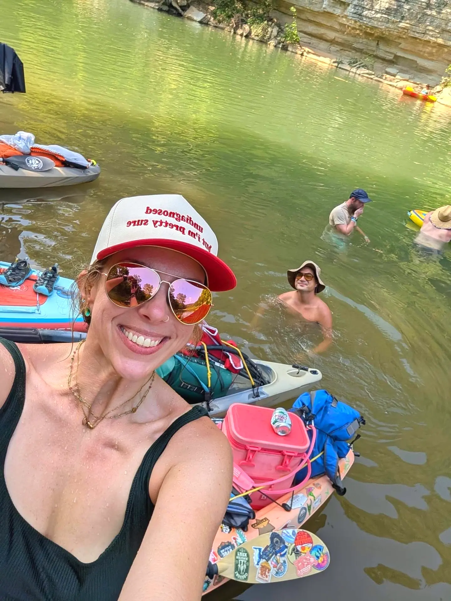 Taking a break in the clear water during a river float