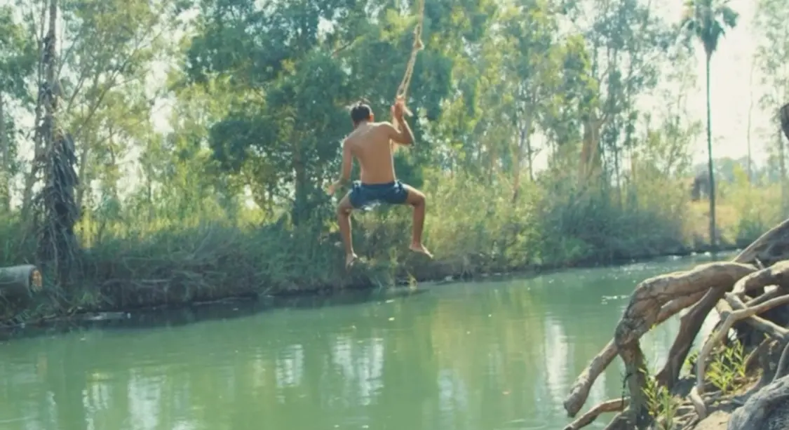 Rope swing jump over the Buffalo River