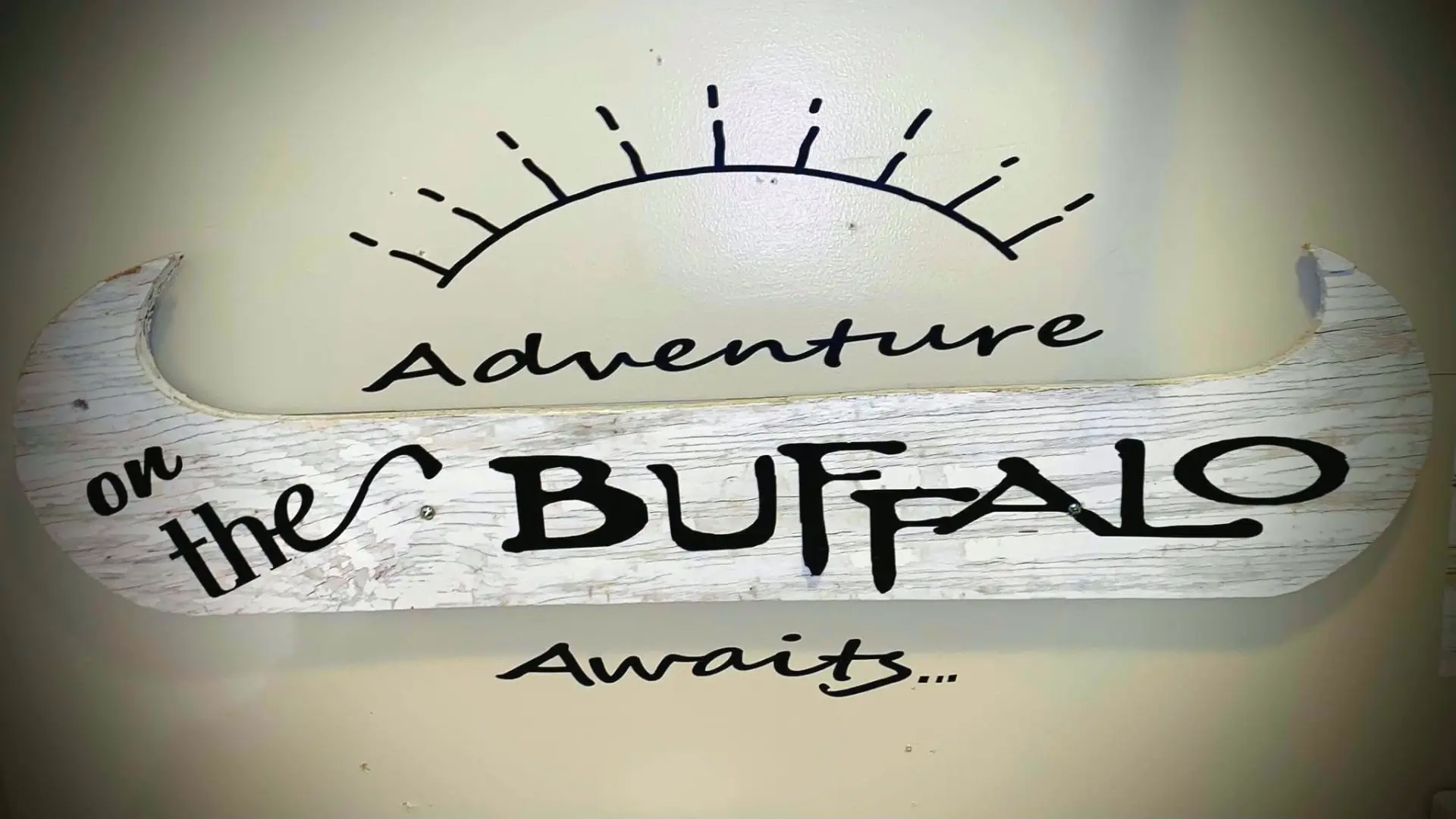 Adventure on the Buffalo sign